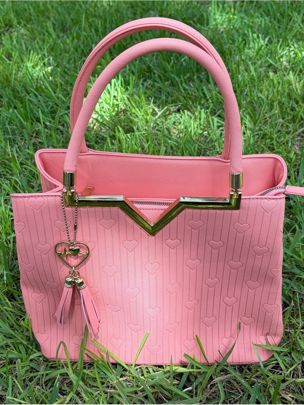 Crossi Pink Structured Heart-Embossed Tote Bag with Tassel Charm